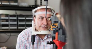 Patient in eye scanner