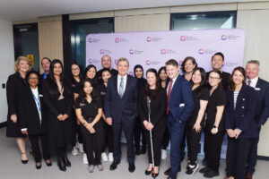 A dozen clinicians standing with Cerulea Clinical Trials CEO Michelle Gallaher, Professor Keith Martin, Cerulea Clinical Trials Chair, CERA Managing Director and University of Melbourne Professor and Head of Ophthalmology, Victorian Deputy Premier and Minister for Medical Research, the Hon Ben Carroll, and breakthrough Victoria chair John Brumby